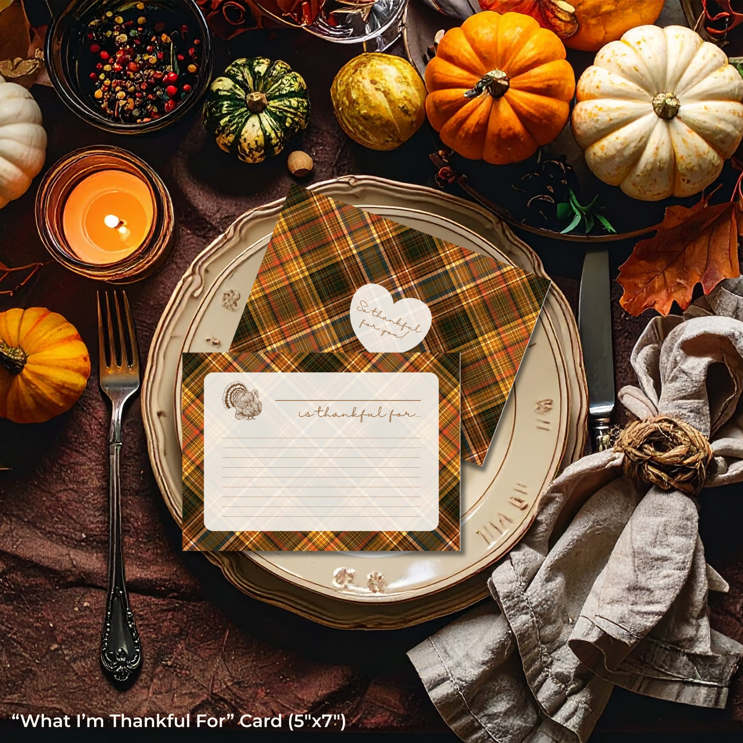 Thanksgiving table setting with pumpkins, candles, and a 'What I'm Thankful For' card.
