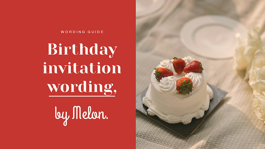 Small white birthday cake topped with strawberries, set beside white peonies