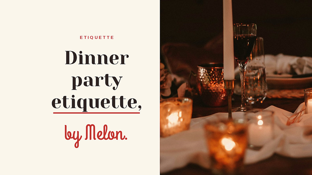 Candlelit dinner party table with tapers, votives and wine glasses