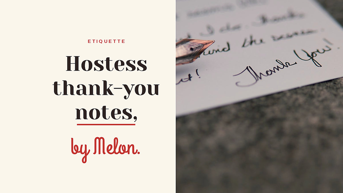 Handwritten thank you note and fountain pen on a dark surface