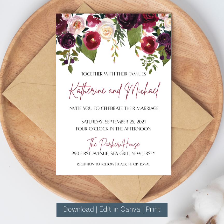 Wedding invitation card with floral design on a wooden plate